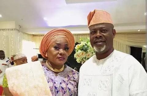 man and woman in traditional attire