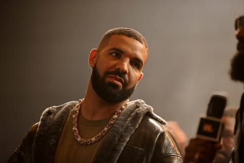 man with beard and jewelry