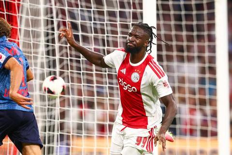 Ajax player celebrating near goal