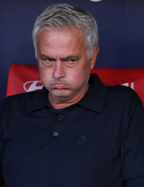 man in a navy polo shirt