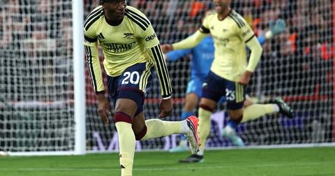 Arsenal player number 20 celebrating after scoring