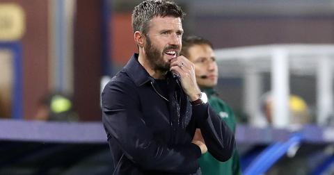 manager looking pensive on the touchline