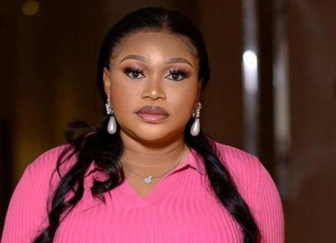 Ruth Kadiri in a pink top