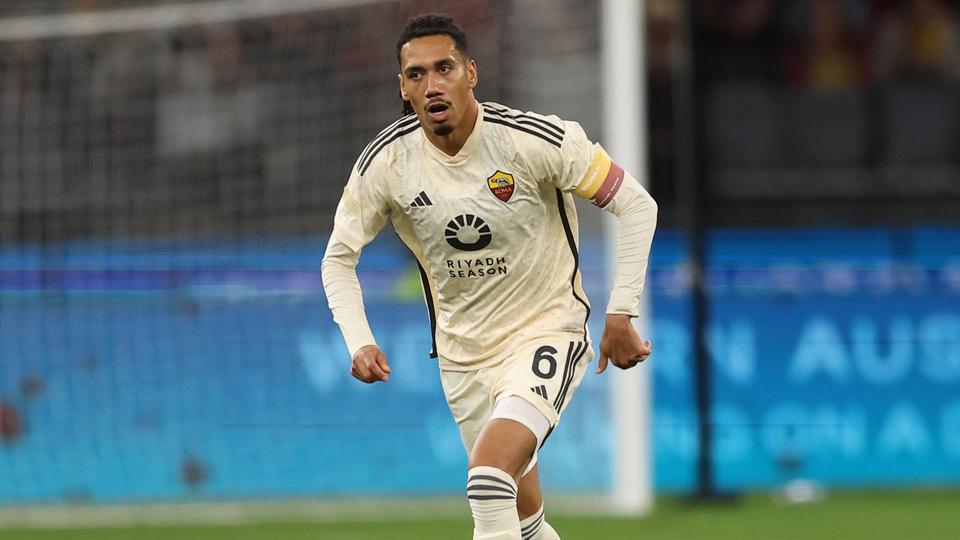 Chris Smalling in AS Roma kit on the pitch