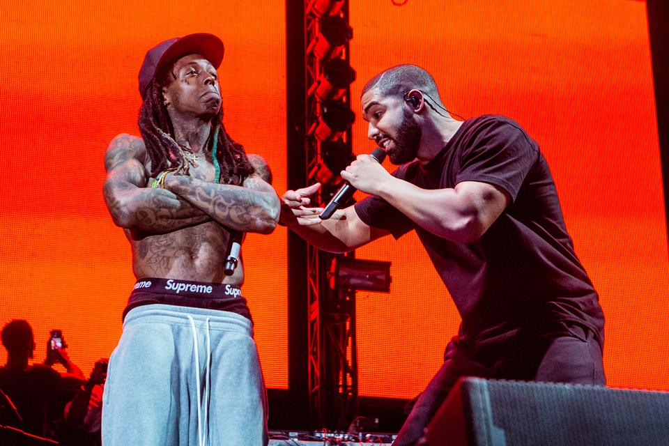 Lil Wayne and Drake performing on stage