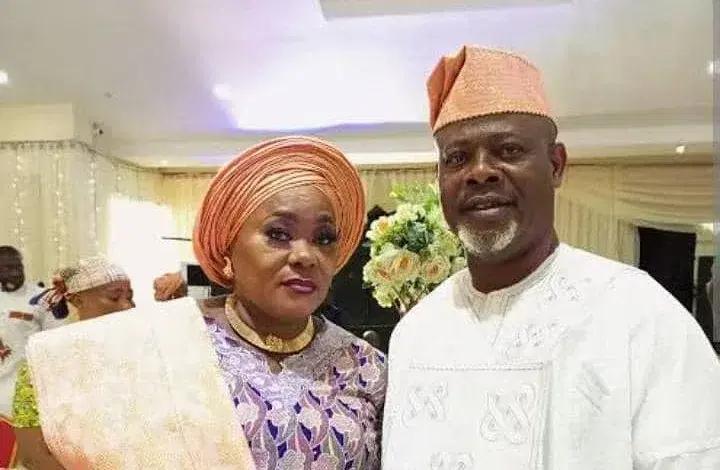 man and woman in traditional attire