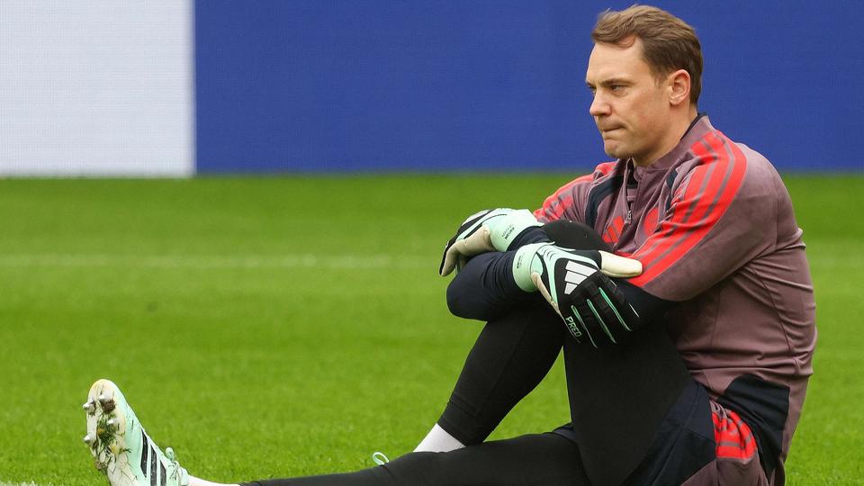 goalkeeper sitting on pitch
