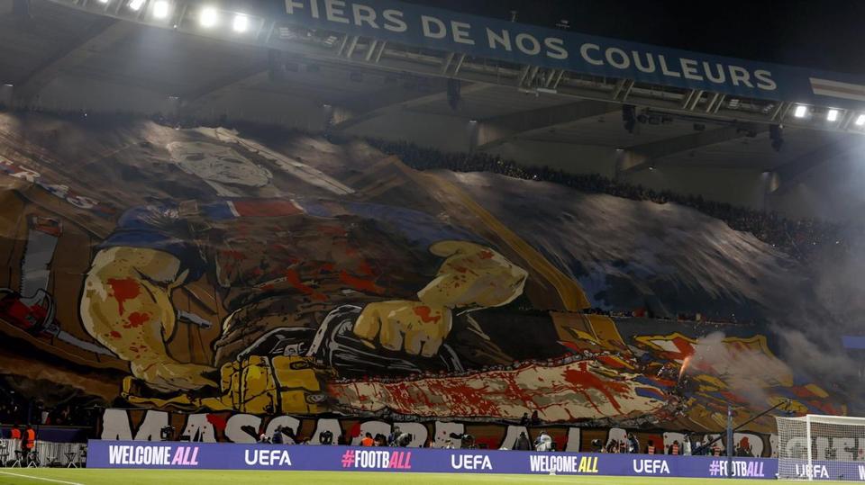 PSG tifo showing a figure with a chainsaw