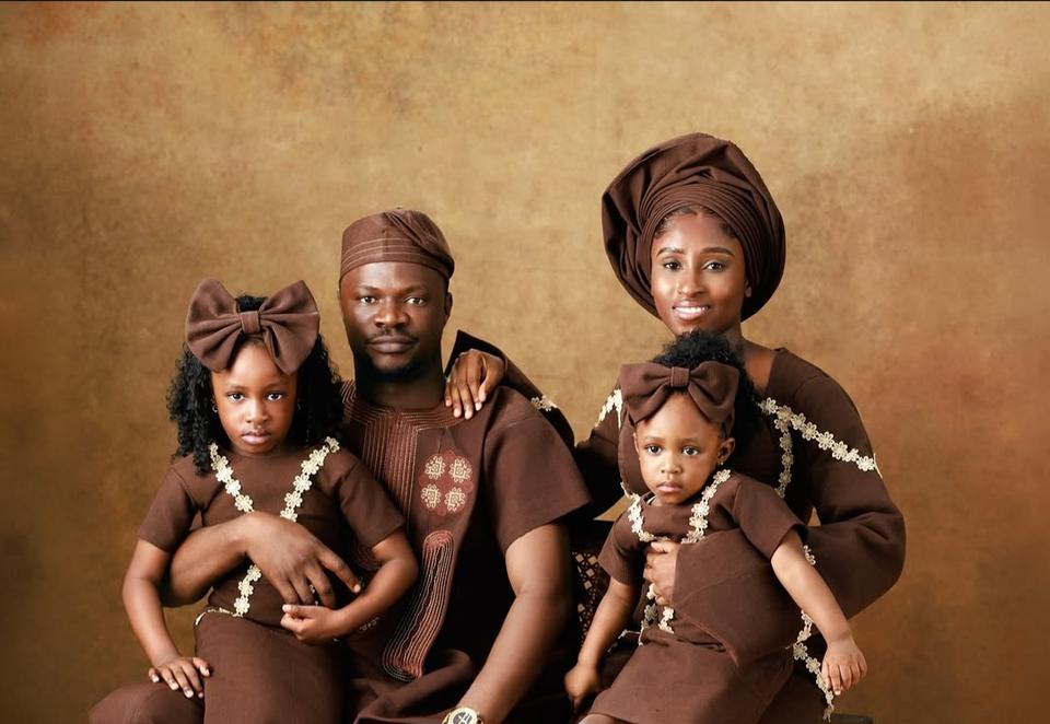 family portrait of a man, woman, and two children