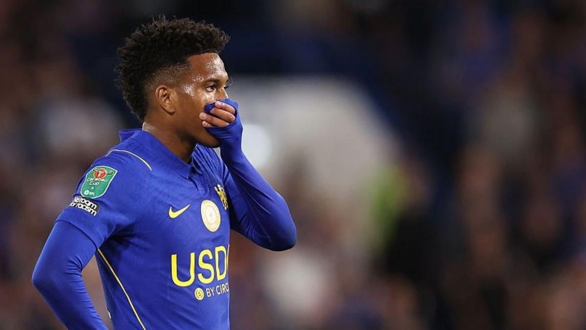 Estevao in action for Chelsea, hand to mouth